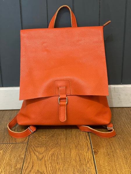 Orange leather backpack on sale